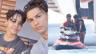 كريستيانو يمنع أبنه من حمل الهاتف المحمول.
