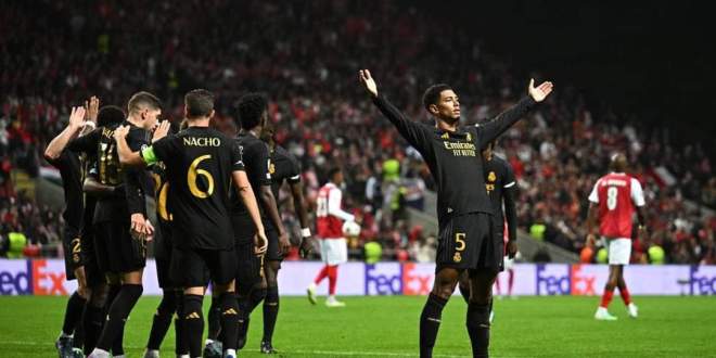 ريال مدريد يفوز على سبورتنج بثنائية مقابل هدف في دوري الأبطال.